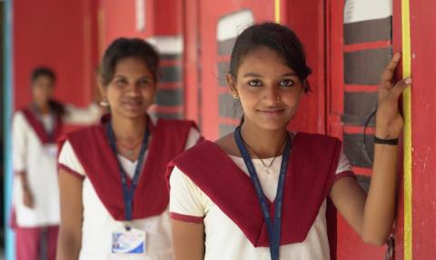 Girl students standing at the school campus