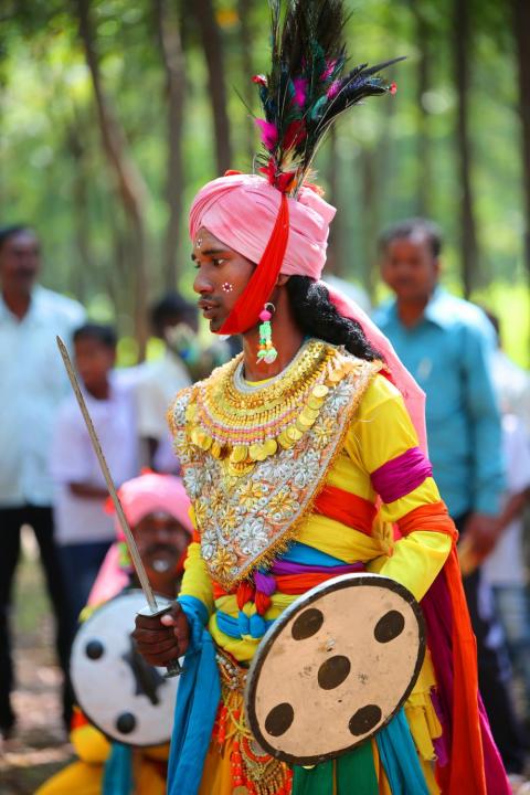 Portrait of a man performing jharkhand traditional dance