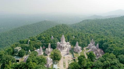 Wide landscape view of Parashnath Temple