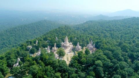 Wide landscape view of Parashnath Temple