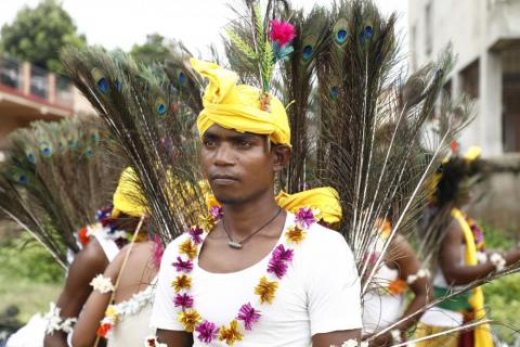 Tribals getting ready for dance during karma puja celebration