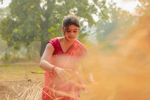 Woman working in village