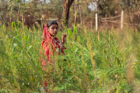 Woman standing in field