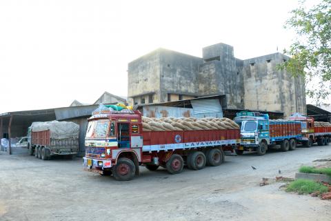 Trucks standing in godown